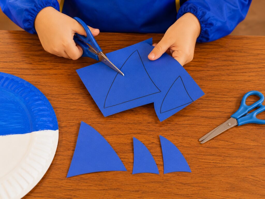 Draw and cut the shark fins