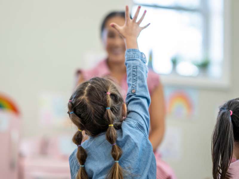a child asking a question in class